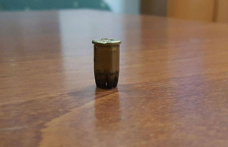 Bossolo di proiettile esploso davanti alla porta della sede di Arcigay Napoli