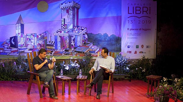 Carlo Calenda a Capalbio Libri: “La Repubblica detta la linea politica al PD. E’ demenziale”. E’ subito polemica