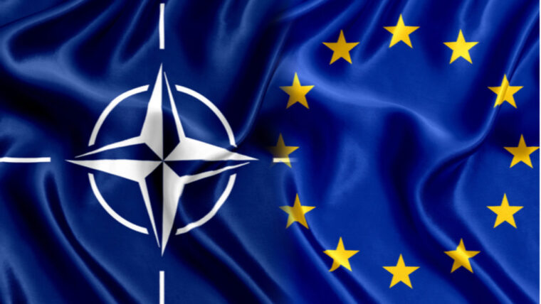 E adesso siamo anche alla guerra tra articoli e commi di UE e Nato